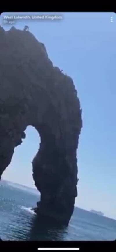 Jumping off Durdle Door