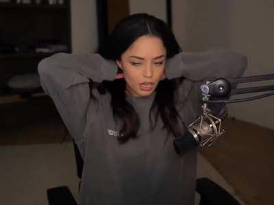 Rae playing with her hair and looking beautiful