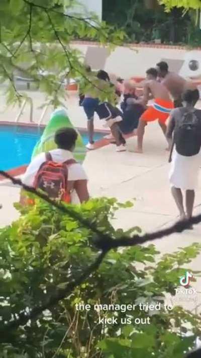 Kids throw hotel manager in the pool because he told them non guests couldn't use the pool
