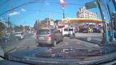 Big truck going downhill on a busy streer