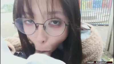 Amateur Japanese Girl With Glasses Deepthroating A Cock In A Park