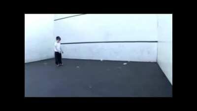 Tennis ball throw it against the Wall