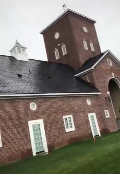 WCGW attempting to kick a ball over a building