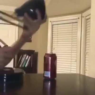 Pixar with a dr pepper can