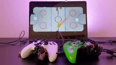 I printed a second Xbox arm controller and decided to have an air hockey AI battle . I used unity to make the game and unity ml-agent to handle all the reinforcement learning thing . It is sim to real which I am quite happy to have achieved even if there 