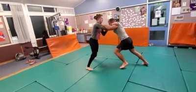 Woman vs Man in Wrestling Practice (Technically not BJJ but still a cool stand-up grappling display)