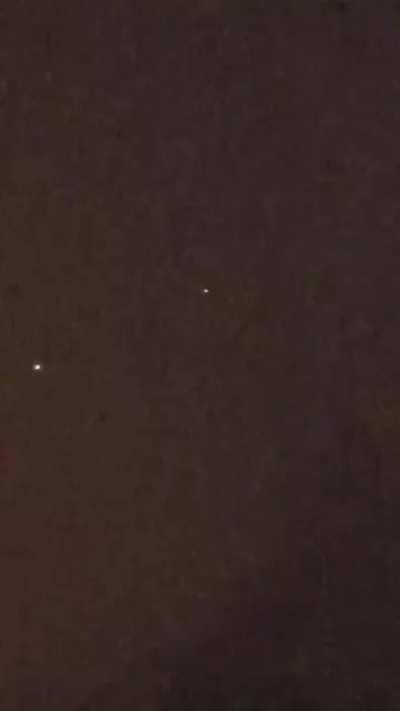 Please explain? 8 PM Central time, Fayetteville AR. Notice the stationary light that moves while the other passes by it.