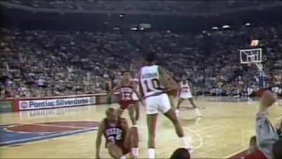 Charles Barkley and Dennis Rodman battle for a rebound