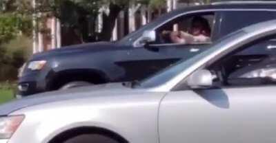 BLM/Antifa Karen showing the Trump supporters who's boss. Until she rear-ended the car ahead of her while having the cops on her tail....