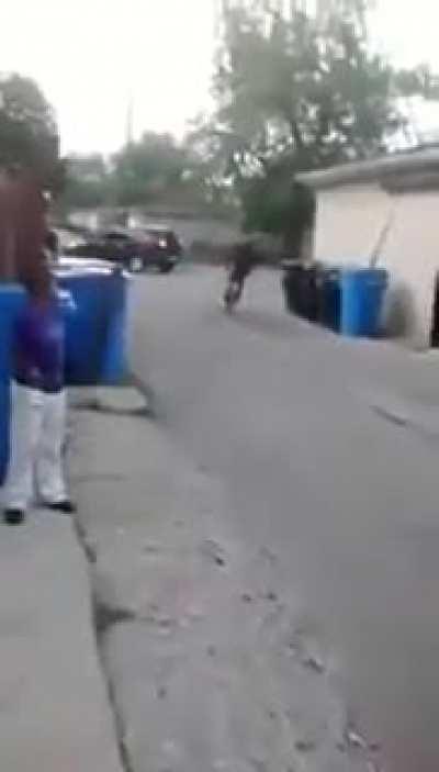 Kid being picked on pretends he's had enough and gets on his bike to ride home, but it was all a ploy so he could pull off the greatest reve