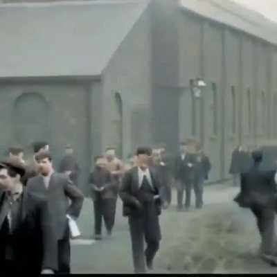 Two workers get in to a fight at the Pendlebury Colliery, a coal mine in North England. The first ever recorded street fight, 1901.