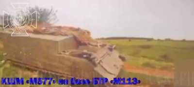 RU POV: Fiber-optic drone hit abandoned Ukrainian M577 in the Kharkov oblast.