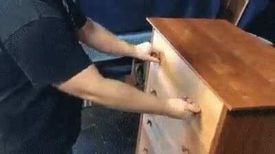 False bottom drawer with dual latch.