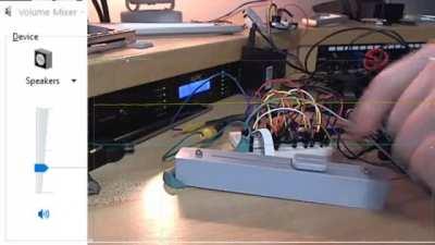 Volume control slider for desk