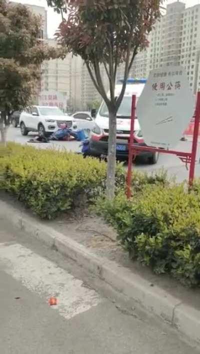 Calls the ambulance, get hit by it