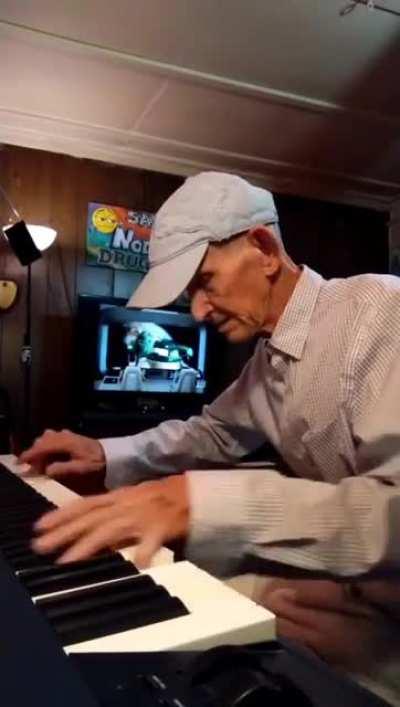 Grandpa 'Funky Geezer' casually warming up his fingers between naps.