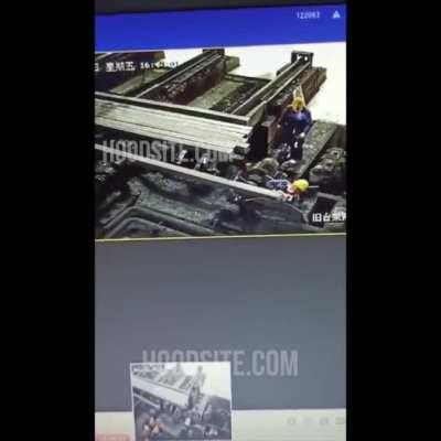 Worker Pinned Against Machinery, China