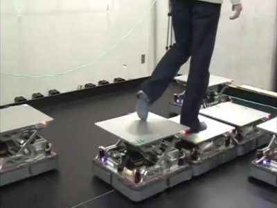 Japanese researchers at the University of Tsukuba created CirculaFloor, robotic tiles that let you walk infinitely in VR without ever leaving your spot.