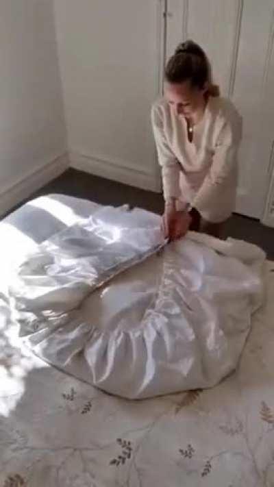 How to fold a fitted sheet.