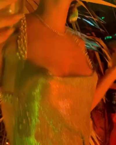 In golden dress, NYE