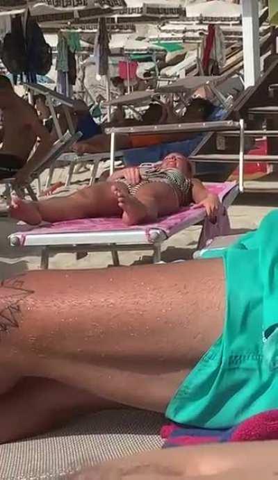 Now there’s a cool girl trying to get the genie out of the lamp in public.