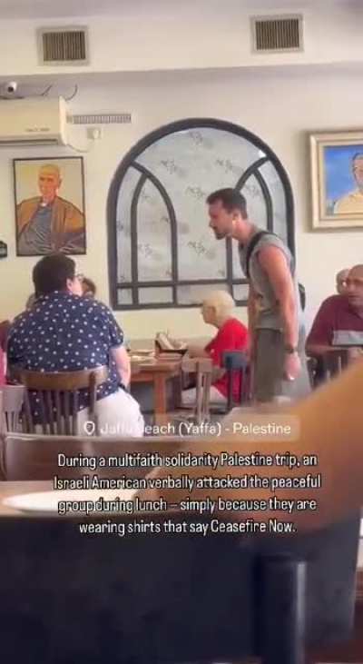 An Israeli-American verbally attacks a peaceful group during their lunch for wearing shirts that say “Ceasefire Now”.