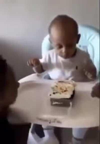 seems like a awful way to waste a cake (and a child)