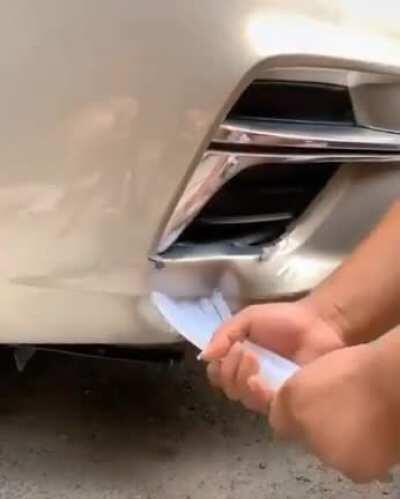 Fixing a car dent the improper way
