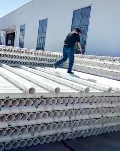 You can either work hard or work sma... on your balance and aptitude. The way he offloads these pipes makes any other way look stupid and inefficient.