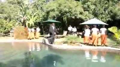 WCGW making a music video next to a swimming pool