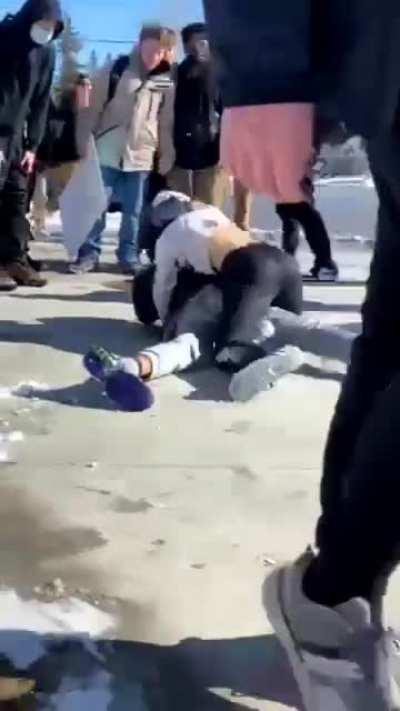 fight because white kid called the other kid megamind because he has a big forehead