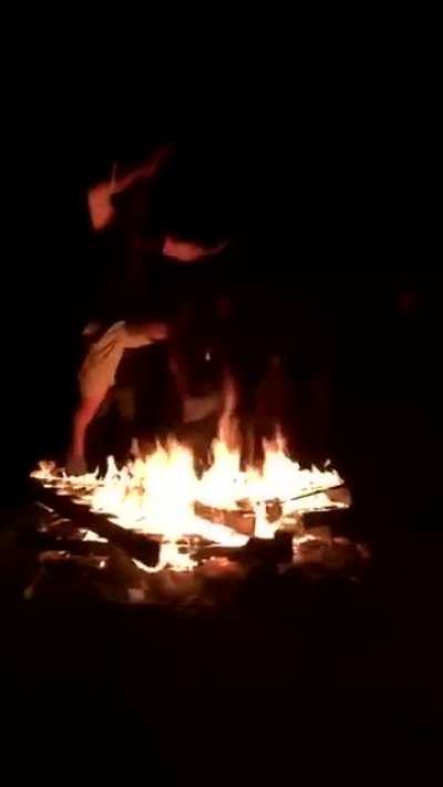 Jumping over a fire.