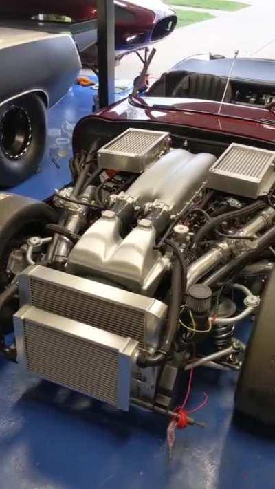 I see your V10 powered Datsun 240Z and raise you a twin turbo Dodge V10 powered Jaguar E-Type