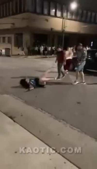 Woman kicks a random person's car