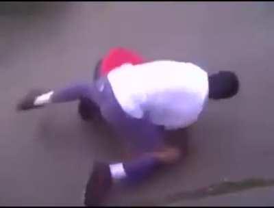 Ground and pound followed by rear naked choke in a street fight