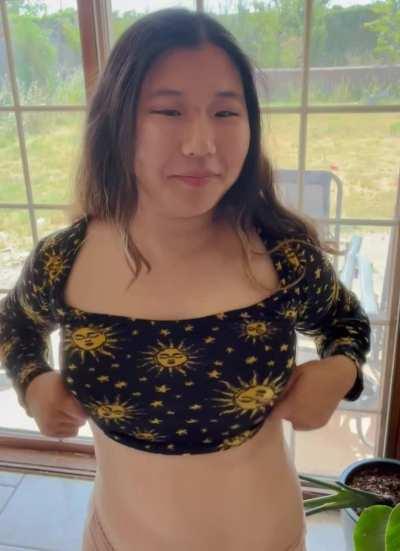 Perky Korean tits look small under a shirt