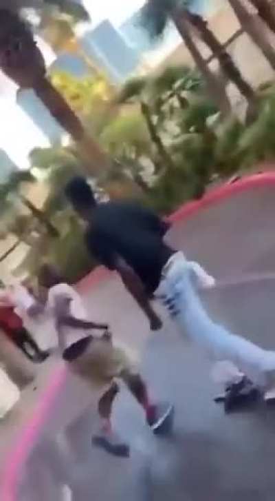 Peep the guy in red practicing his boxing skills