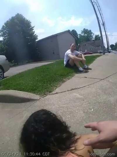 Crazed Woman drags an officer by car, breaking two of his bones. Officer still manages to arrest her.