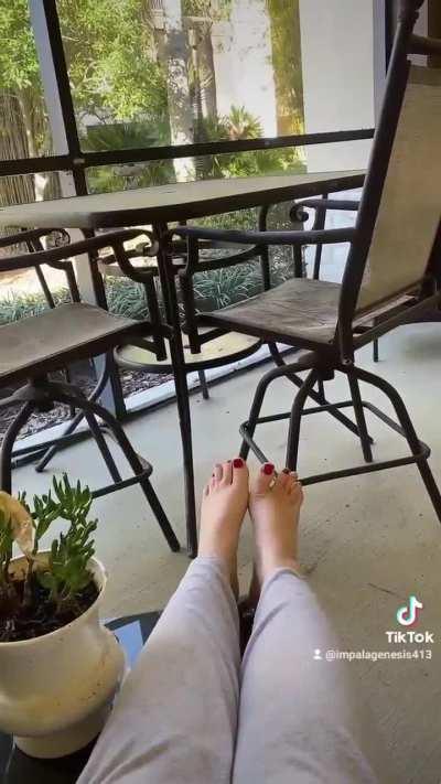 Teasing passersby with my feet 