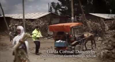 They really sent some random sham to an African village dressed as a guardi