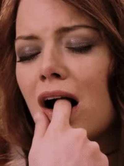 Emma Stone loves a finger in her mouth