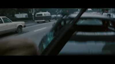 I see your Tom Cruise hip draw and raise you Val Kilmer's mag change in Heat (1995). Marines and Army Rangers have used this clip as an example of proper reload technique and how to retreat during contact.