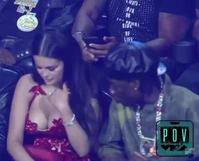 Selena Gomez sitting down