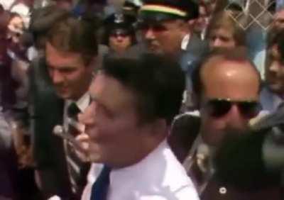 A lady arguing with Ronald Reagan, New York