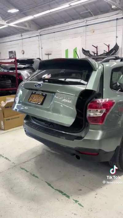 Customer complains rear door automatically closes without warning