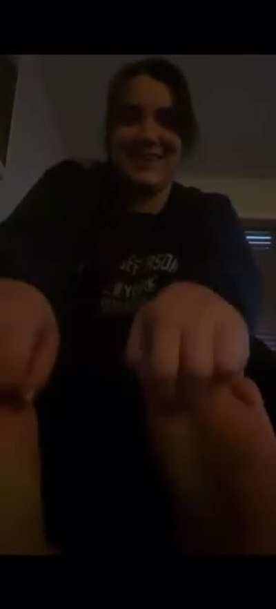 Girl tickles boyfriend’s feet