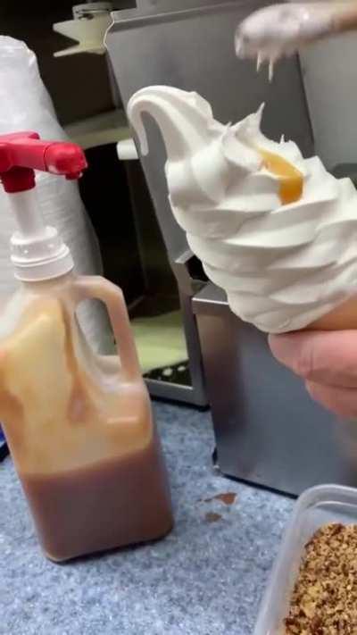 Filling up an ice cream cone