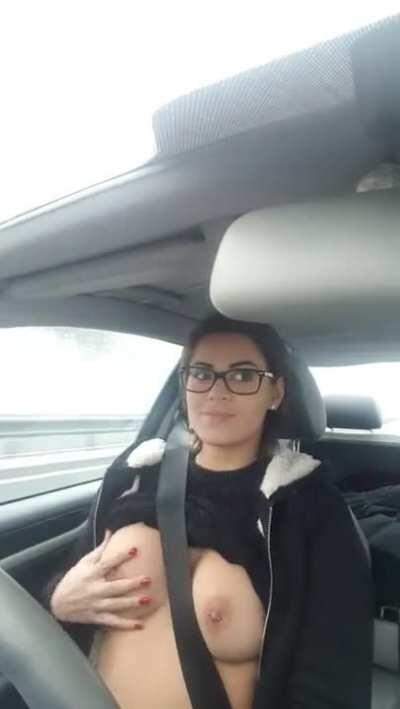 Beautiful Girl Playing With Her Tits While Driving