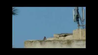 Syrian insurgents video an SAA soldier firing an RPG towards them (2012, Syria).