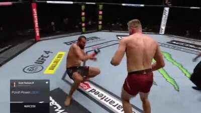 Domick Reyes threatens Jan Blachowicz to get in to his guard, Jan backs up to keep the fight standing.